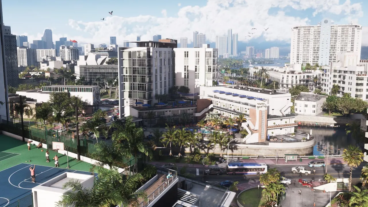 Vice City apartment blocks, a basketball court and palm trees on a sunny day
